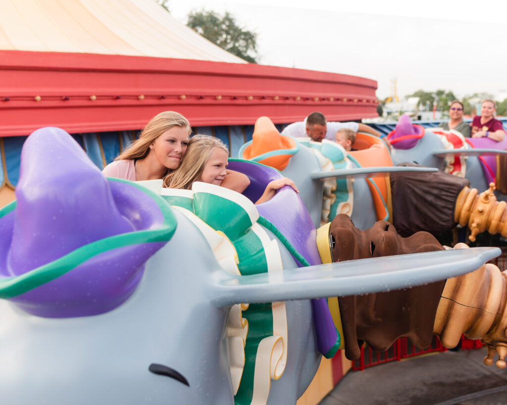 family riding dumbo walt disney world